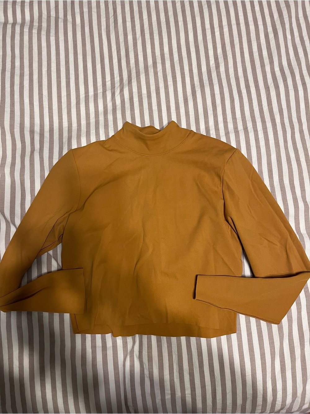 Nike Women's Cropped Mock Neck Top in Mustard